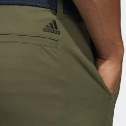 Adidas Golf Trousers - Primegreen Tapered Pant - Olive Strata AW23 19 Adidas Golf Trousers - Primegreen Tapered Pant - Olive Strata AW23 -Fashion Golf 0007 hr9048 7 apparel on model detail view 2 grey